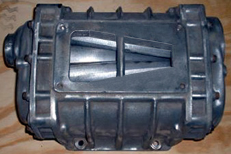 G.M.C. 4-71 supercharger with working exhaust port masked for efficiency
