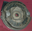 Conical backing plate and shoes